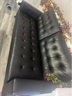 Faux leather black futon sofa