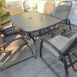 Six Chairs Outside Table