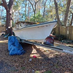Boat And Trailer  Needs deck replaced. 