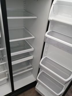 Whirlpool black side by side refrigerator  33" wide -free delivery