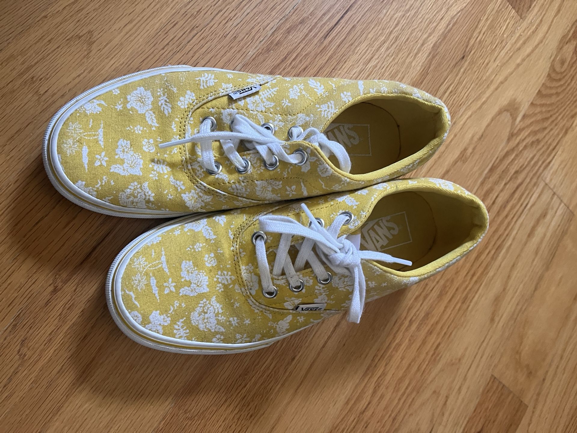 Yellow Vans With White Flowers