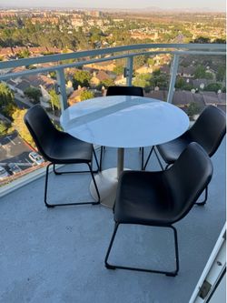 Glass Circle Table - Ashley’s