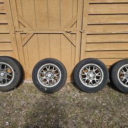 Set of 4 Michelin X-Ice Snow Tires with Rims, 25 inches