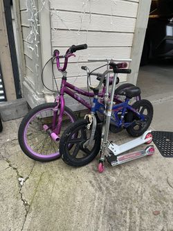 Two Kids Bicycles And Two Scooters