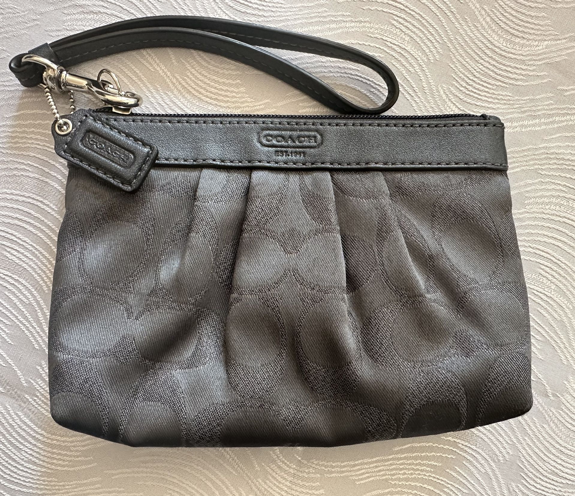 Coach Signature Logo Wristlet Clutch in exellent condition(cash & pick up only)