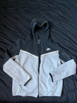 Black and grey Nike tech