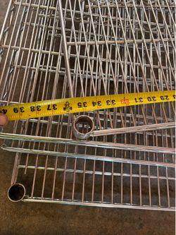 Shelving rack w/ locking wheels