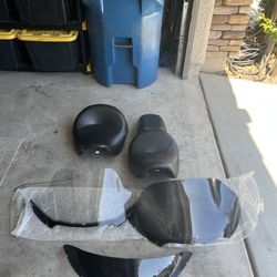 Motorcycle seats and windshields. (all sold separately)