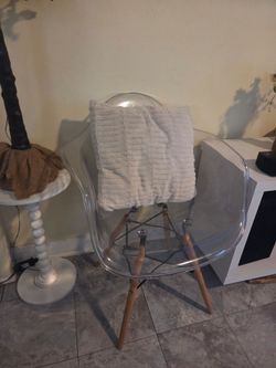 Clear/ ghost chair w/ wooden legs n pillow