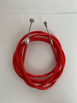 Bicycle red brake cable housing and wire with two different cable heads