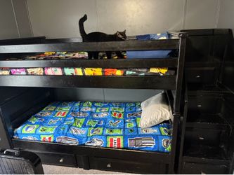 Bunk bed with stairs and 6 drawers.
