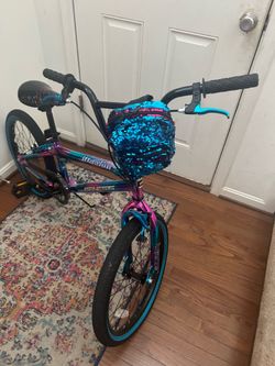 Rarely used 20 in wheels girl bike with bag