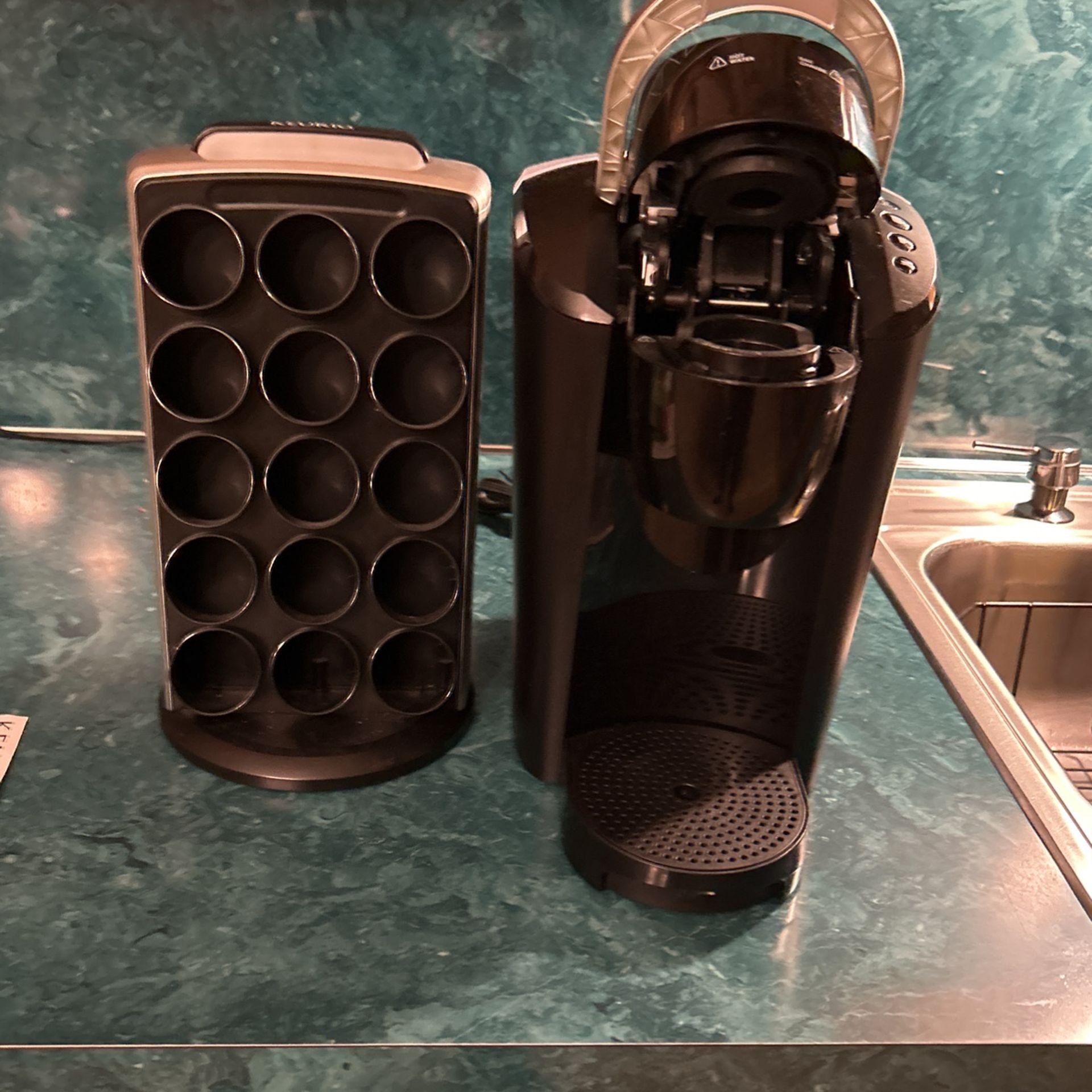 Keuriq 2.0 Coffee Maker With Pod Holder And Cleaning Accessories Shown In Photo