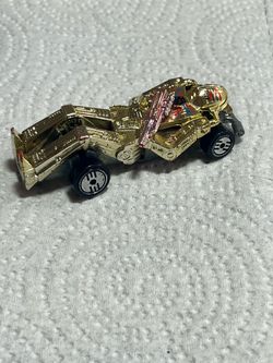 HOT WHEELS ZOMBOT RACER CAR GOLD PINK GUN DIE CAST MATTEL 1986 VINTAGE
