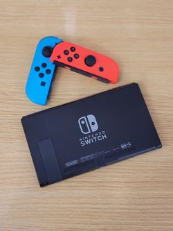 Nintendo Switch - V2 with Orange and Purple Joy-Con