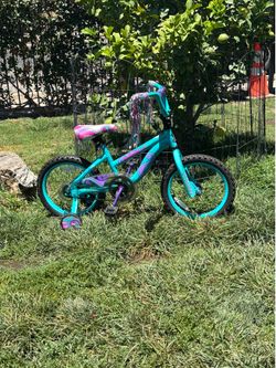 16 INCH GIRLS BIKE..WITH TRAINING WHEELS