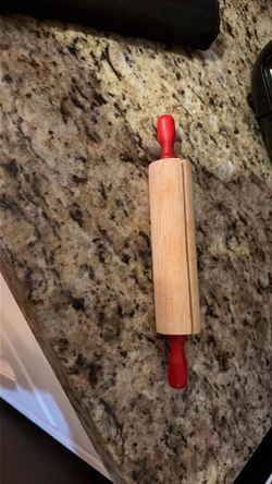 Recipe holder in the shape of a rolling pin