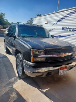 04 Chevy avalanche. Runs, good drives, good.
