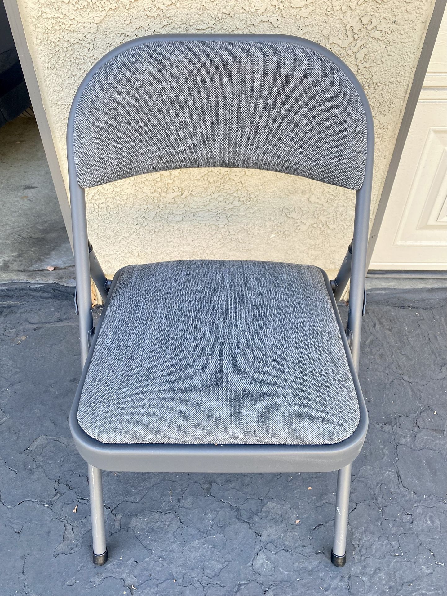 4 Upholstered Folding Chairs