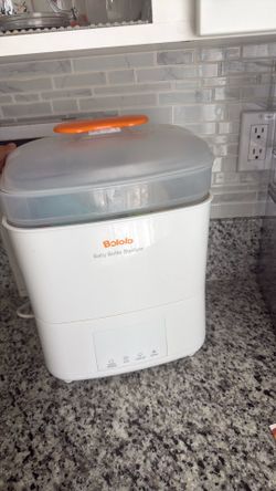 Baby bottle and sterilizer