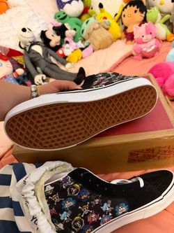 One piece vans shoes size 10 black and white  and the blue and white ones