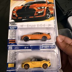 Auto World Diecast Mustang/nissan 