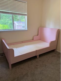 IKEA extendable pink bed for kids with extendable mattress included