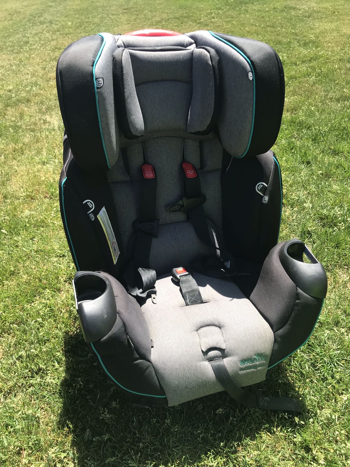 Blue and gray car seat for boy.. 4 Point seat
