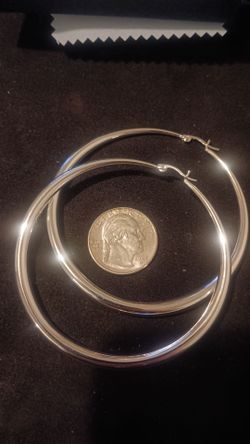 Beautiful large hoop earrings marked S925