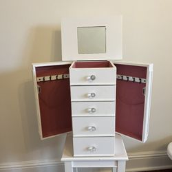 White Jewelry Armoire With Pink Interiors 