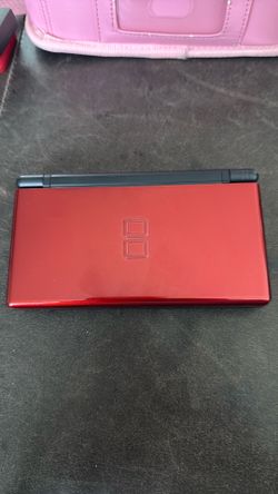 Nintendo DS Lite . 10 games, coming with charger and case.