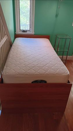 Ikea twin bed with 6 storage drawers  + New mattress