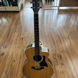 TAYLOR TAN ACOUSTIC GUITAR IN GOOD CONDITION WITH SOFT CASE