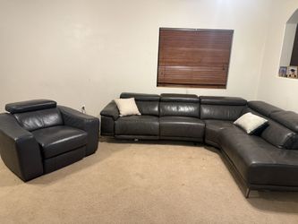 Leather Power Reclining Sectional And Armchair Set
