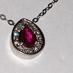 14k White Gold And Diamonds, With A Pear Shaped Pink Gemstone .
