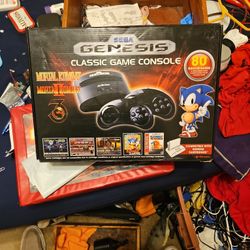 Sega Genesis Classic Game Console.  80 Built In Games.  Plugs To TV And Is Ready To Use.  Both Controllers And Console Included.  Can Also Be Used To.