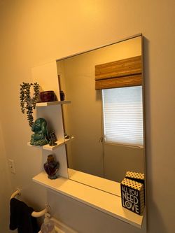 Bathroom mirror with shelves