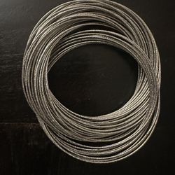 Multi-strand rolling bangle bracelet