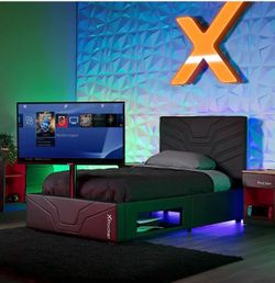 Rocker X twin bed w/ TV