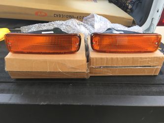 1998-2000 Tacoma 2WD bumper turn signals new