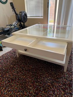 Glass display top coffee table