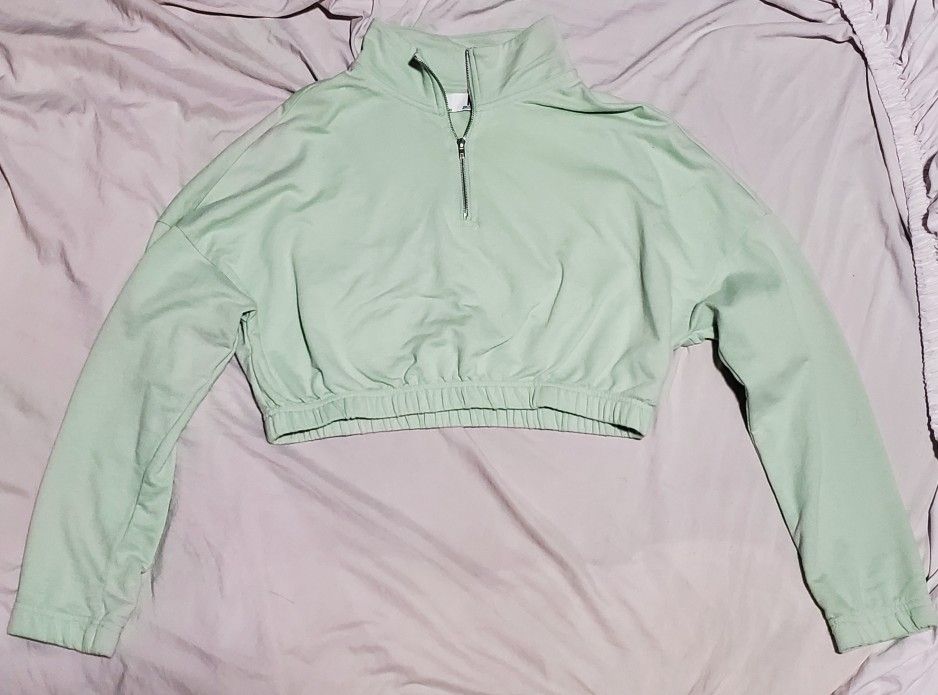 light green 3/4 zip-up crop top