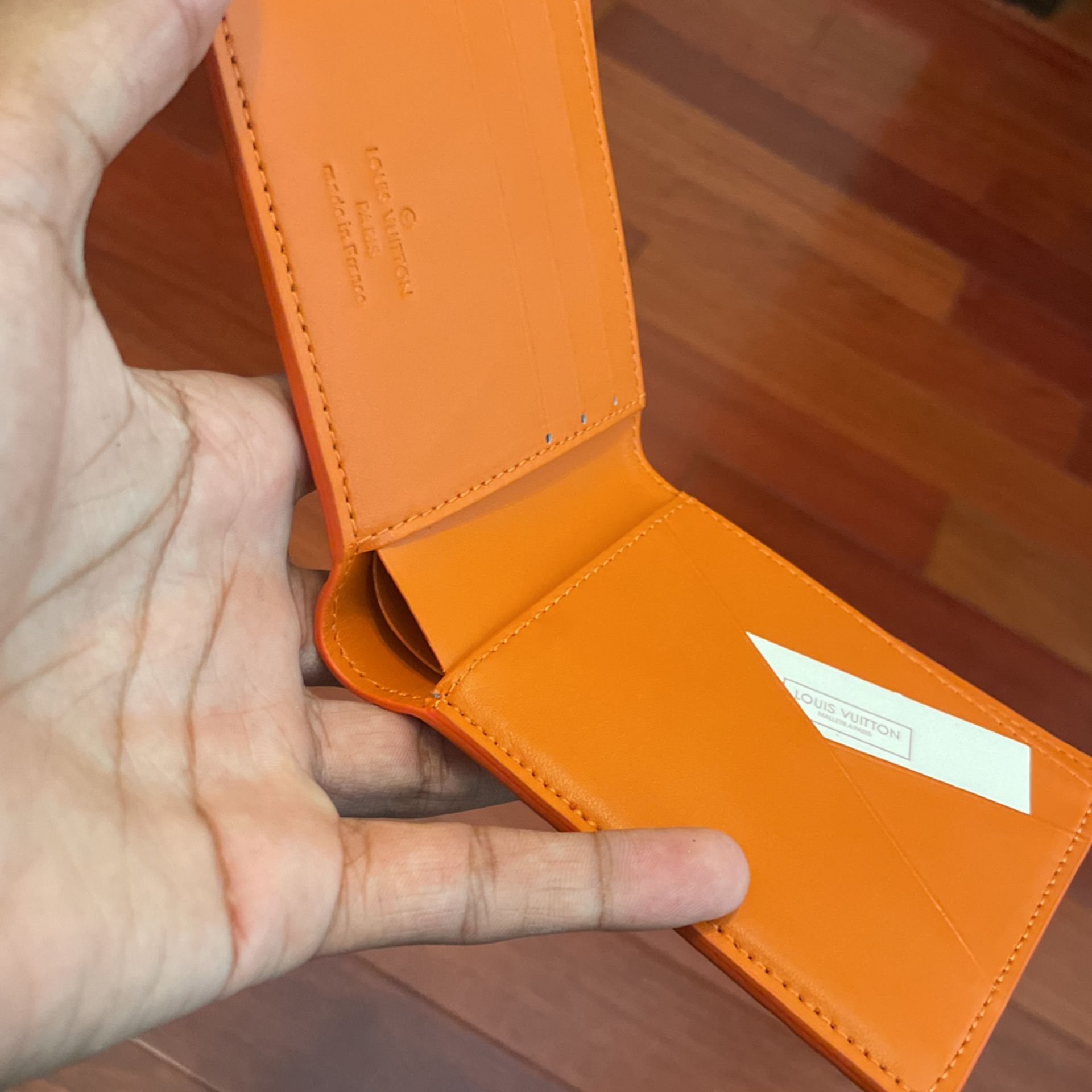 Men's Louis Vuitton Orange Slender Wallet for Sale in Yukon, OK - OfferUp