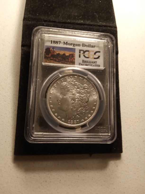 1887 Morgan silver dollar Uncirculated Graded Brilliant