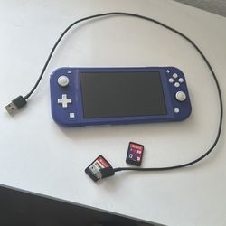 Nintendo switch lite + 2 2 physical games