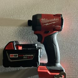 Milwaukee M18 Red Lithium Ion Brushless 1/4 In Hex Impact And M18 Red Lithium  5.0 Battery 