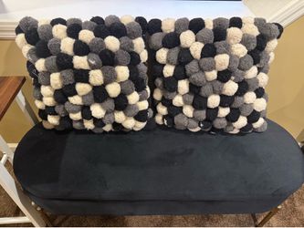 Black storage bench with 2 mackenzie child decorative pillows