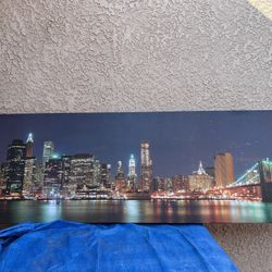 New York City Manhattan Skyline Panorama with Brooklyn Bridge and Office Skyscrapers Building in At