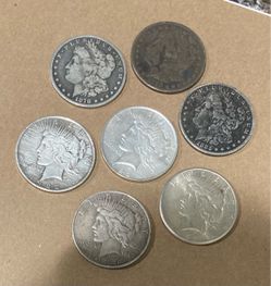 90% Silver Morgan and Peace Dollars  $50 Each
