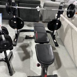 Weight Utility Bench With A Barbell & Weight Plates